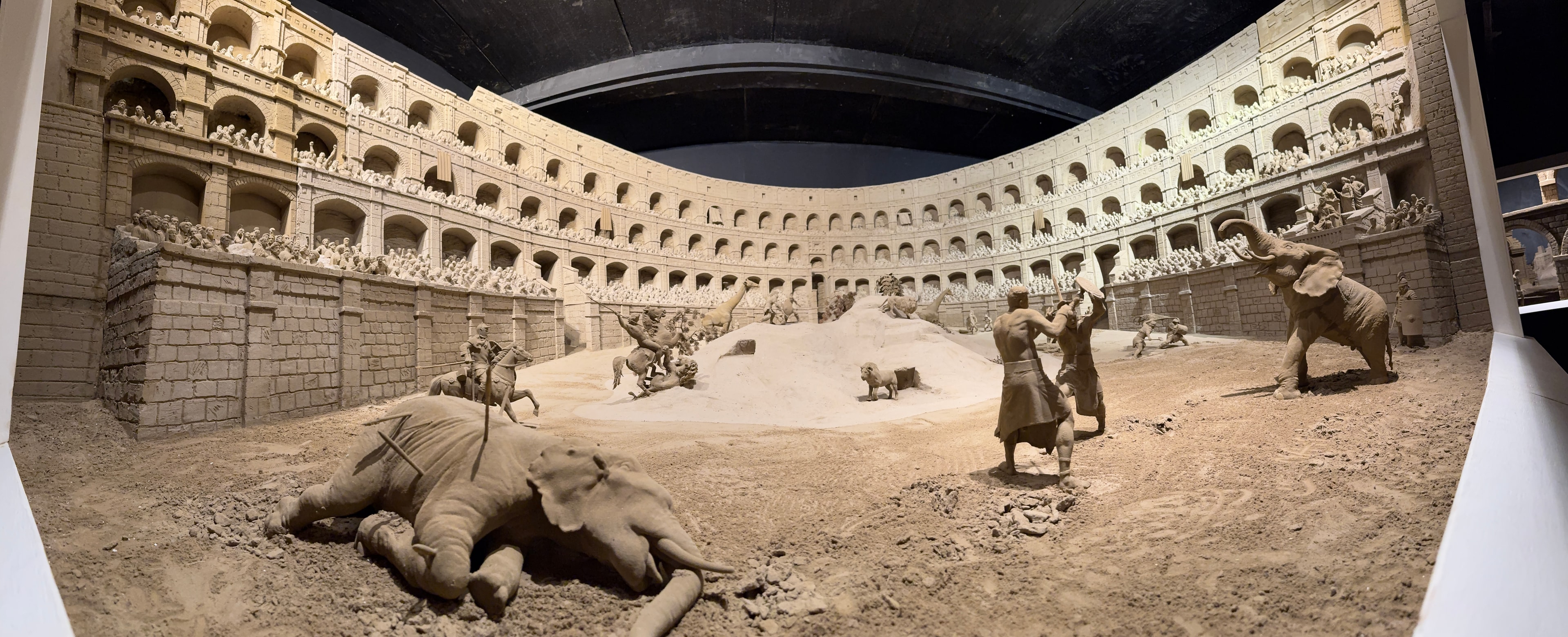 Sand sculpture colosseum scene