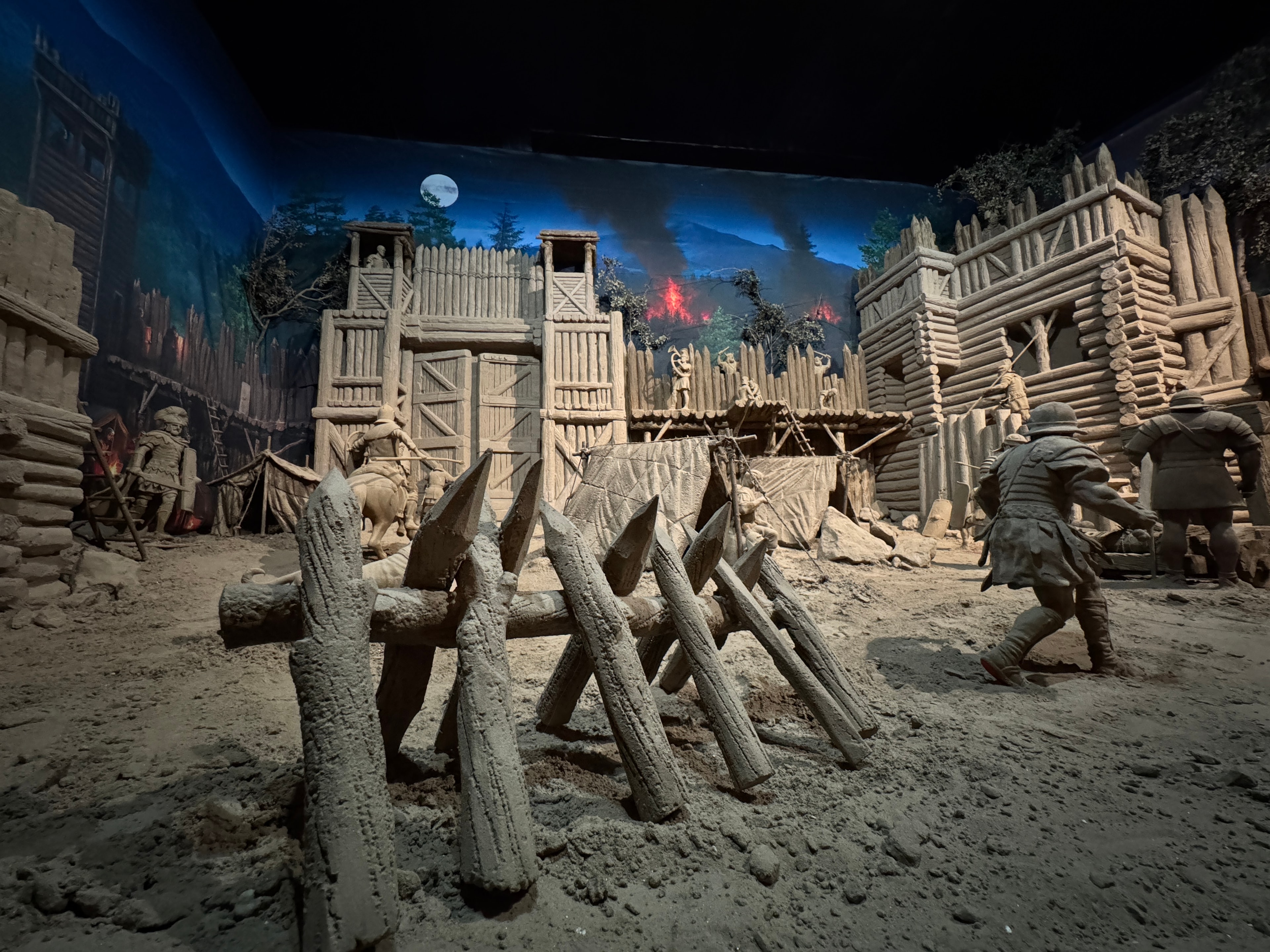 Underground cave with illuminated wooden structures